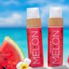 Cocosolis Watermelon Sun Tan & Body Oil on the beach
